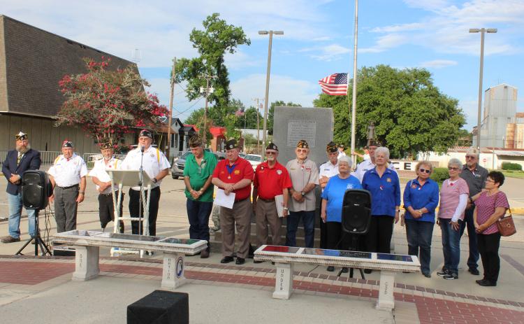 Donnie Fontenot, VFW Post 8971 commander, welcomes the public Monday to the Memorial Day ceremony.