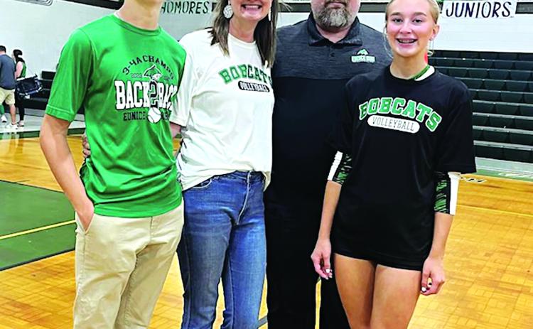 Coach Tre Brown with his family. From left are his son, Beau, a sophomore at Eunice High; his wife, Lauren; Brown, and his daughter, Ava Grace, a senior at Eunice High. (Photo by Rhett Manuel)
