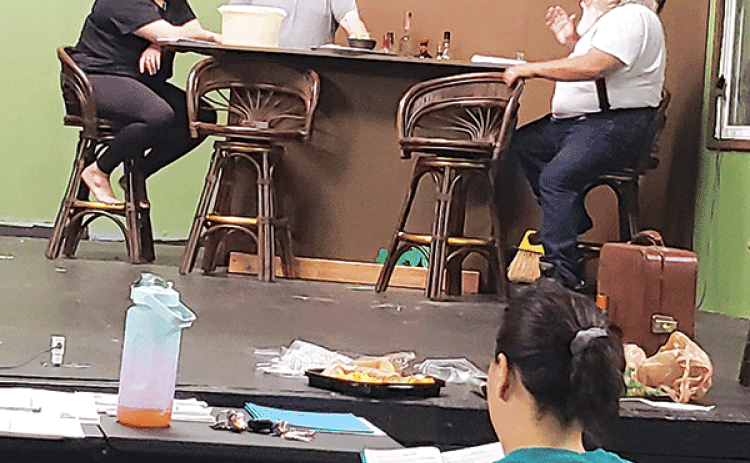 From left, are Becca LaFleur as Abby, Josh Faulkner as Jamie, and Brett Faulkner as Man rehearse a scene from ‘Now and Then’ at the Eunice Players’ Theatre. (Submitted photo)