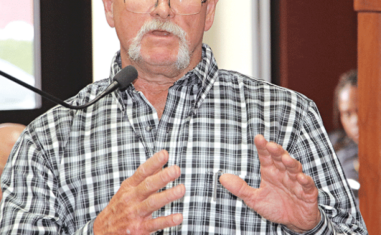 Frank “Buddy” Helton Jr., chairman of the Central St. Landry Economic Development District, speak at the June 5 Parish Council meeting. (Photo by Harlan Kirgan)