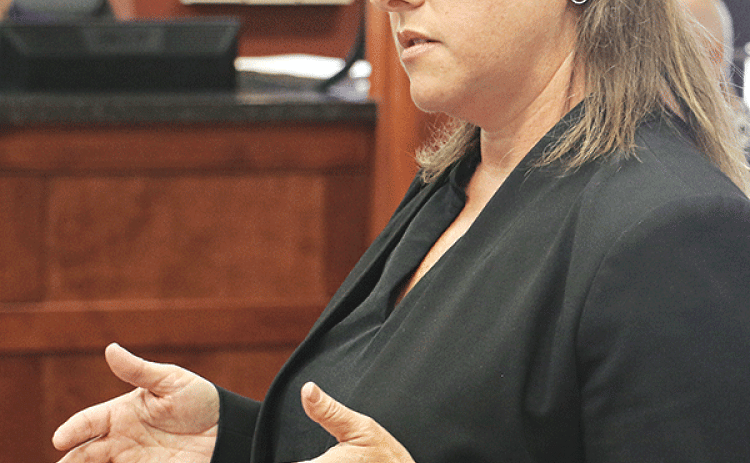 Jennifer Ardoin, an attorney for St. Landry Parish Clerk of Court Charles Jagneaux, speaks at the Parish Council’s Administrative-Finance Committee meeting on Wednesday. (Photo by Harlan Kirgan)