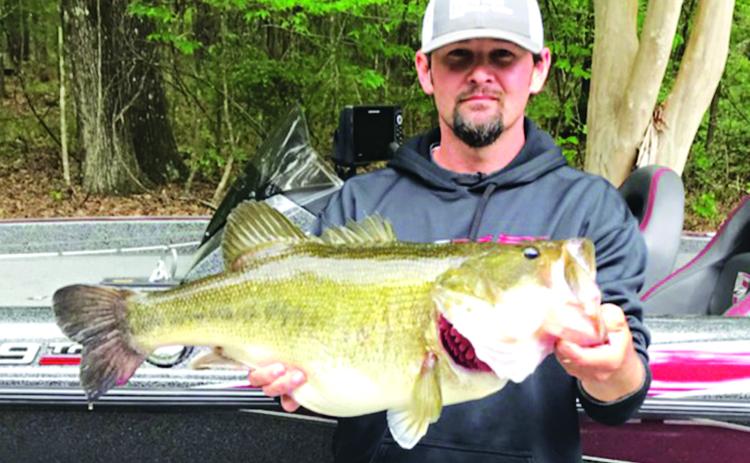 Ricky Fontenot, of Bayou Chicot, holds an 11.22-pound, 26-inch bass t he caught at Chicot Park on March 22. (Photo courtesy of Marianne Fontenot)