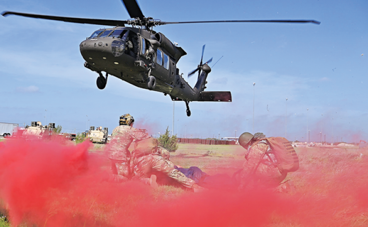 A UH-60 Black Hawk helicopter, 1-244th Assault Helicopter Battalion, Louisiana Army National Guard, prepares to land to pick up a simulated casualty during the 2022 Joint Emergency Medicine Exercise at Fort Hood, Texas, June 8. The JEMX hosted by the Carl R. Darnall Army Medical Center brings together over 2,000 Service Members from across the services to train medical personnel in combat casualty care, aeromedical care and Forward Resuscitation Surgical Team care. (U.S. Air National Guard photo by Master S