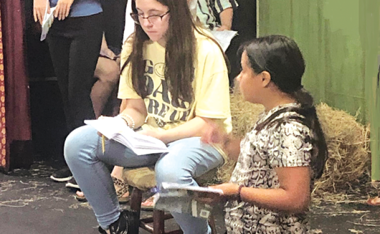 Rehearsing for “Charlotte’s Web,” from left, are Shelby Niles, Sadie Maricle, Elizabeth Duhon and Lillian Veillon. (Submitted photo)