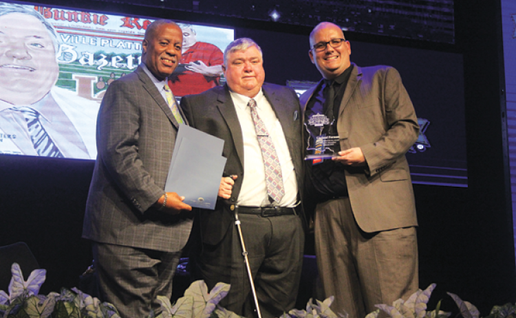 From left are State Sen. Gerald Boudreaux, Distinguished Service Award recipient Garland Forman, and Louisiana Sports Writers Association President Raymond Partsch III. (Photo by Tony Marks/Ville Platte Gazette)