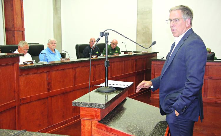 Steve Moosa, right, CPA of Darnall, Sikes and Frederick, presented an audit of St. Landry Parish Government to a meeting of the Parish Council’s Administrative-Finance Committee on Wednesday. The audit is for the 2024 fiscal year that ended Dec. 31, 2024. Seated, from left, are Council members Harold Taylor, Ken Marks, Timmy Lejeune and Ernest Blanchard. (Photo by Harlan Kirgan)