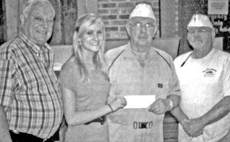 VFW Post 8971 presents scholarships. Cesly West, a senior from Eunice High, received a $1,000 scholarship from the Eunice Veterans of Foreign Wars Post 8971. From left are Louis Pavur, post adjutant; West, Post Commander Al Courville, and Post Quartermaster Hilton Lavergne. 