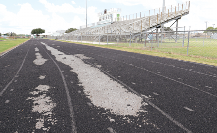 The surface of the track at Eunice High School shows wear. (Photo by Harlan Kirgan)