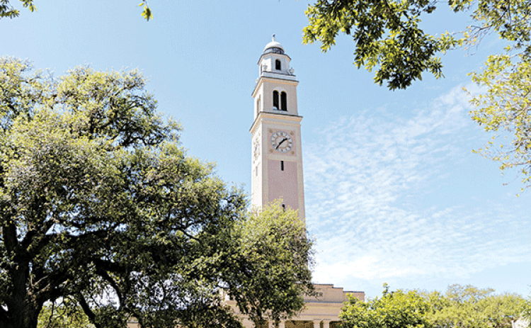LSU’s Memorial Tower displays the time on Monday, March 20, 2023, on Tower Drive in Baton Rouge. (Matthew Perschall for Louisiana Illuminator)