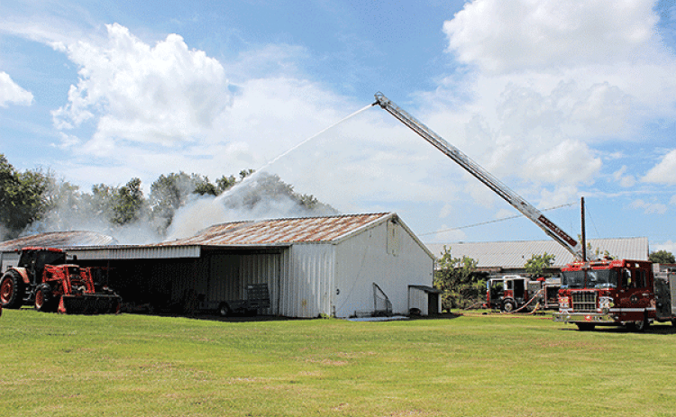 Eunice firefighters and St. Landry Parish Fire District 6 responded to a structure fire at 3304 Hwy. 190 east at about 3 p.m. Thursday. A storage building located behind the Purple Peacock was engulfed with smoke coming from the roof. Part of the roof was collapsing. Owner of the building and J & M Auto Sales & Detailing, LLC, Jahamal Guillory said that the metal building is at least 30 years old and about 5,000 square feet. Guillory said he uses the building for storage. He had stored inside a motorcycle,
