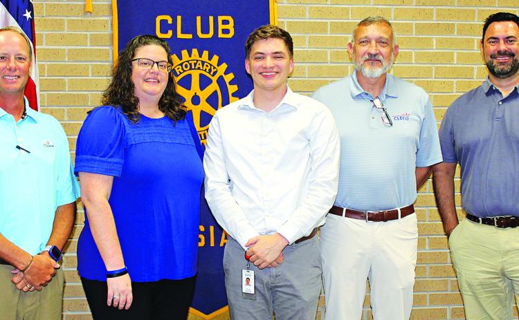 The Rotary Club speaker Wednesday was Colie Plaster with Cleco. From left, are Tommy Hebert, Cleco government affairs manager; Erika Fontenot, Rotary Club president; Colie Plaster, Cleco communications representative; Willie Bergeron, Cleco governmental service representative; and Jacob Bergeron, Rotarian. Plaster was the guest of Bergeron. (Photo by Myra Miller)