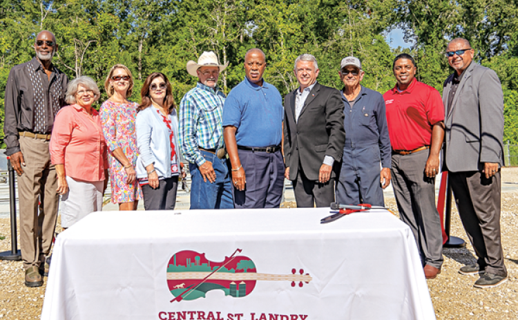 Attending a ribbon-cutting for  $4.5 million wastewater treatment facility in Opelousas on July 15, from left, were Senic Batiste, Yvonne Normand, Ammy Taylor, Tina Vidrine,  Frank “Buddy” Helton, Sen. Gerald Boudreaux, Bill Rodier, Daniel Lyons, Rep. Dustin Miller and Opelousas Mayor Julius Alsander. (Submitted photo)