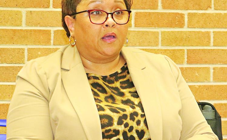 Dwanetta Scott, executive director of Child Welfare & Attendance, reviews policies at a St. Landry Parish School Board committee of the whole meeting on Monday.