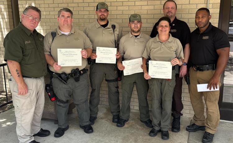 Sheriff Bobby Guidroz announced four corrections deputies have graduated from the State of Louisiana Basic 92-hour course.  During the course, deputies are instructed on the use of force, inmate care, introduction to weapons and contraband control. The St. Landry Parish Sheriff’s Office uses in-house, state certified instructors to train deputies prior to their attending a more extensive corrections academy to become P.O.S.T. – certified corrections officers. Guidroz states, “Our goal is to have every deput