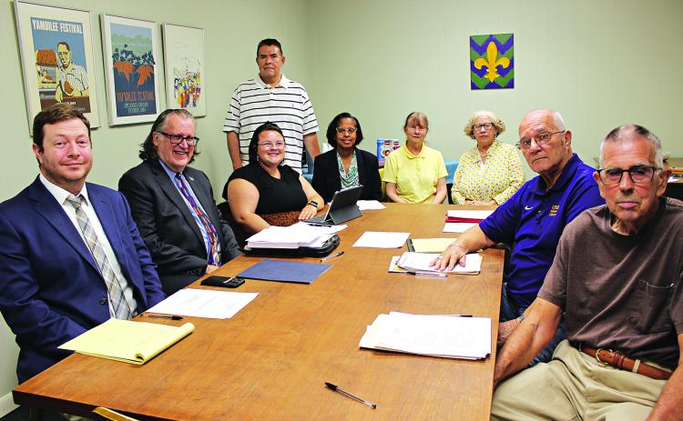 At the Eunice Public Library Board of Control meeting Thursday were, from left, Daniel Monteverde, communications director with state library of Louisiana; Michael Golrick, associate state librarian; Alison Duplechin, library director; and board members Ricky Coutee, Germaine Simpson, councilwoman; Sheila Landreneau, Cinderella Hayes, Tony Baltakis and David Simpson. (Photos by Myra Miller)