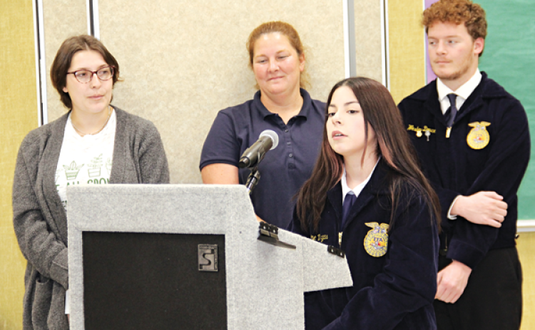 Eunice High School FFA students, Jasmine Vargas and Wesley Doucet were state winners and advance to compete on the national level.  Vargas and Doucet were introduced at the St. Landry Parish School Board meeting on Thursday. At the meeting, from left, are agricultural teachers Brook Comeaux and Rebecca Berzas, and Vargas and Doucet. (Photo by Harlan Kirgan)