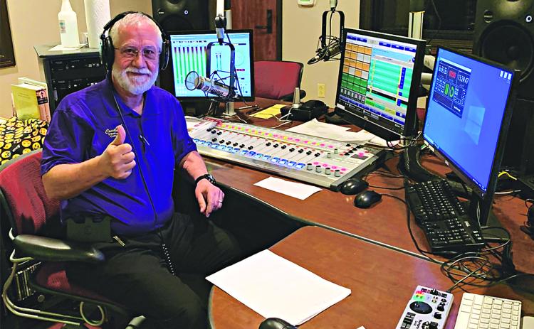 Kenneth Granger on the air in the studio at radio station KRVS. (KRVS photo)