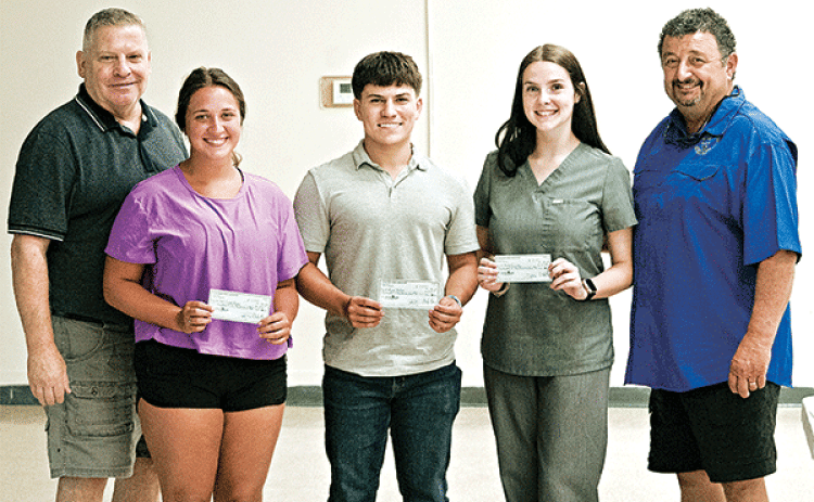 The CFMA, Acadiana Charter Chapter in Eunice, awarded four school scholarships at this month’s meeting to a few outstanding students at $250 each. If they remain in school they receive another $250 in January, 2025. From left are CFMA Vice President Leward Lafleur, Carlie Booth, Ryan Trahan, Mollie Sonnier, and CFMA President Greg Brown. William LeJeune of Iota, who had just returned from a French Immersion class in Nova Scotia is not pictured. (Photo by Rick Nesbitt/KEUN Radio)