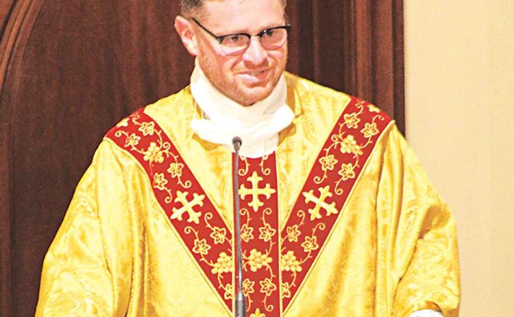 The Rev. Korey LaVergne, pastor, of St. Edwards Church in Richard, give his Homily during the annual Mass for Charlene.