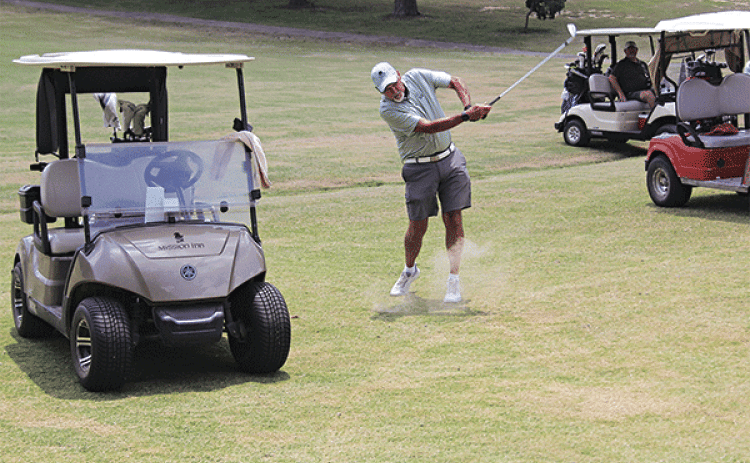 Ernie Deloach fires off a shot during the Deux Coupes Paroissial held at the Ville Platte and Eunice country clubs. (Ville Platte Gazette photo)