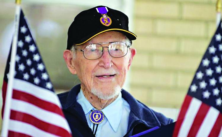 James Bollich, a survivor of the Bataan Death March, was honored with a car parade as he celebrated his 104th birthday on Friday. (Acadiana Advocate photos By Brad Bowie)