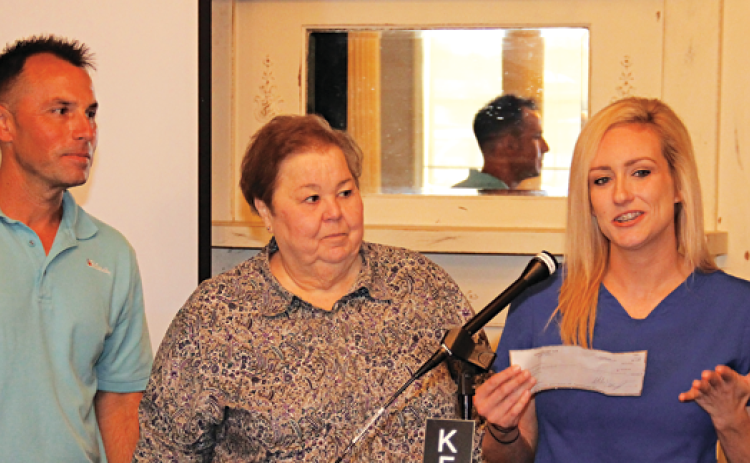 A check for $4,650 from the Eunice Rotary Club was presented to the Eunice Community Health Center at the club’s meeting on Wednesday. The money is from the Eunice Rotary Zydeco Triathlon held in April. Accepting the check on behalf of the clinic was Alisa Ardoin, right. Also shown, from left, are Rotarians Coby Clavier and Pat Dossman. (Photo by Harlan Kirgan)