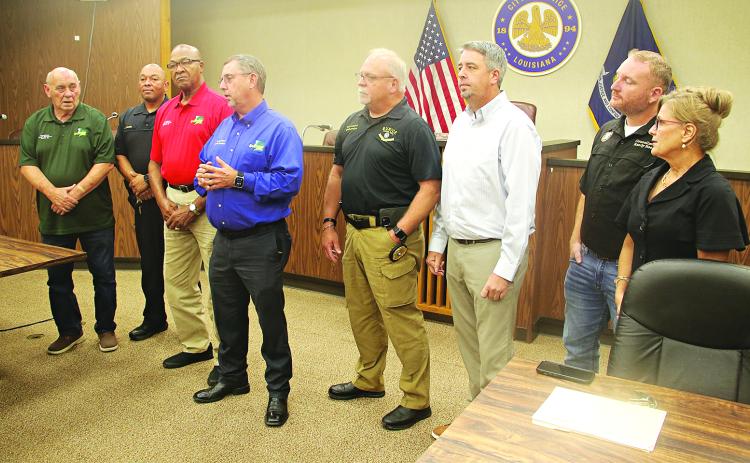 At Wednesday’s meeting in the Eunice City Council Chamber, from let, are: Ernest Blanchard, Parish Council member; Jody White, Parish Council chairman; Jimmie Edwards, Parish Council member; Jessie Bellard, parish president; Kyle LeBouef, Eunice Police chief; Scot Fontenot Eunice mayor; Randall Reed, Eunice alderman; and Connie Thibodeaux, Eunice alderwoman. (Photo by Harlan Kirgan)