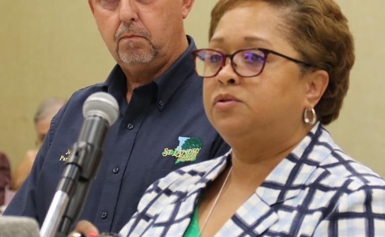 St. Landry Parish President Jessie Bellard, left, is offering two parish investigators to help the St. Landry Parish School District address truancy issues. Bellard is shown with Dwanetta Scott, supervisor of Child Welfare and Attendance, a School Board committee meeting on Tuesday. (Photo by Harlan Kirgan)