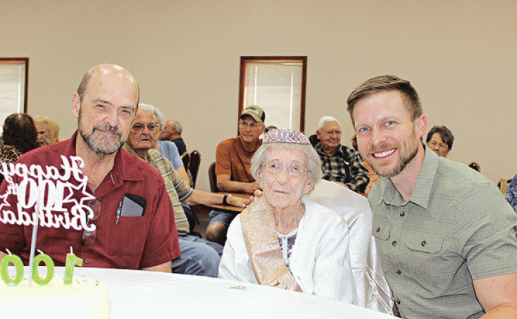 Hazel Reeves celebrated her 100th birthday Aug. 20, and again with her friends at First Baptist Church Thursday. From left, are Neil Reeves of Eunice, a son; Reeves; and the Rev. Andrew Bates, pastor of First Baptist Church. (Photo by Myra Miller) 