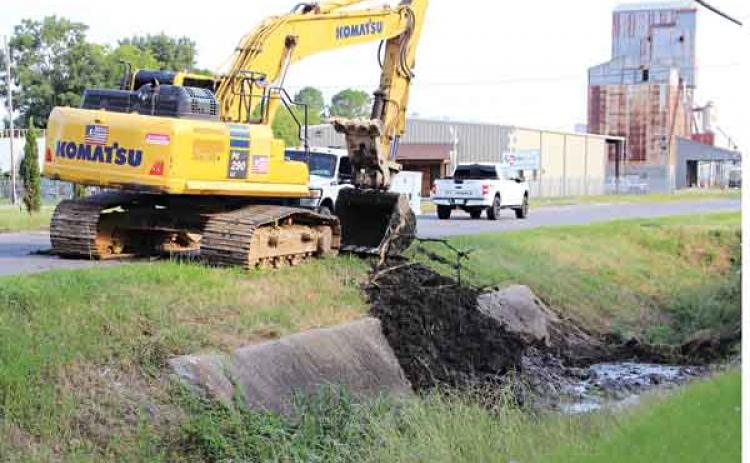 Crews were out Wednesday cleaning the concrete portion of the drainage canal that begins south of Laurel Avenue at Nimitz Street,