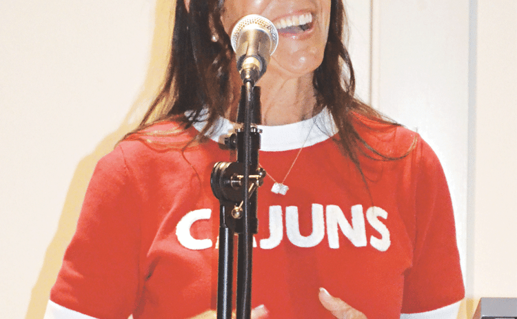Crowley native and UL Softball Coach Alyson Habetz speaks to a standing-room-only crowd during a “Meet & Greet” event at Fezzo’s. Habetz takes over as the softball coach at the Lafayette university after 25 years as the associate head coach at the University of Alabama. (Photo by Steve Bandy/Crowley Post-Signal)