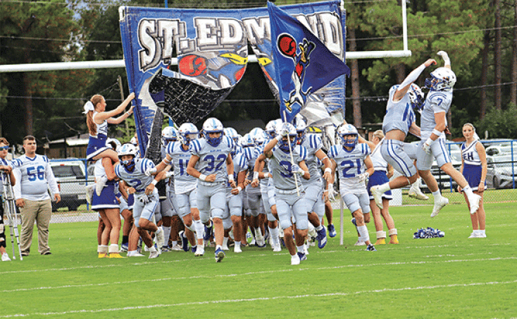 The St. Edmund Blue Jays celebrate the opening of their football season at Friday’s opener of the Joe Nagata Memorial Jamboree. The Blue Jays lost to Catholic of Pointe Coupee 13-12. (Photos by Amy Myers)