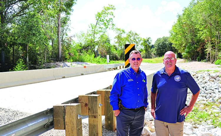 St. Landry Parish Council District 11 representative Timmy Lejeune and Parish President Jessie Bellard are in front of the new bridge on Jessie B Road. (Submitted photo)