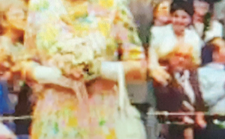 Queen Elizabeth II is shown during a parade in Tampa, Florida, with Eunice resident Donna Baltakis at right in the background. (Submitted photo)