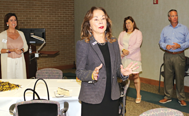 LSU Eunice Chancellor Dr. Nancee Sorenson welcomes those attending the Destination Brunch of the Acadia Parish Tourism Commission. From left, are Nancy Loewer, Acadia Convention and Visitors Commission; Sorenson; Carey Lawson, executive director of the LSUE Foundation and University Advancement; and Jeff Willis, LSUE athletic director. (Photo by Harlan Kirgan)