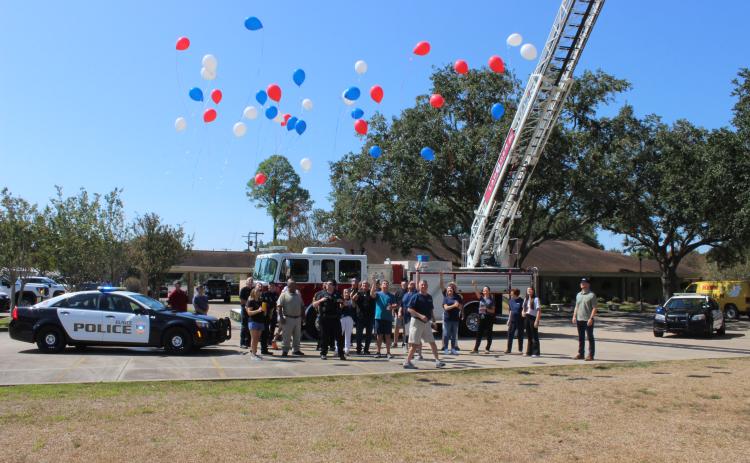 Balloons released at Ardoin's Funeral Home 911 remembrance ceremony