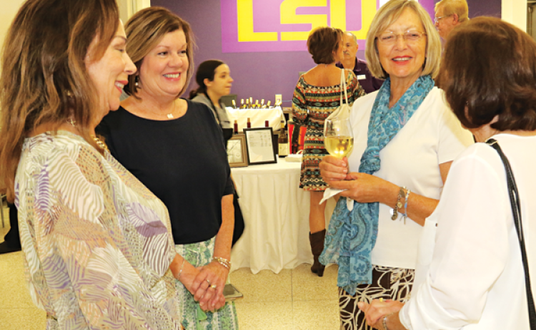 From left, are LSUE Chancellor Nancy Sorenson, Linda Perrodin, Stephanie Guillory and Margaret Frey at a celebration of LSUE’s 55th year. (Photos by Harlan Kirgan)