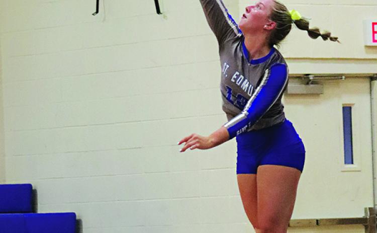 Ava Smith is shown serving as St. Edmund won all three sets against David Thibodeaux 25-5,25-18, and 25-20. (Photo by Amy Myers)