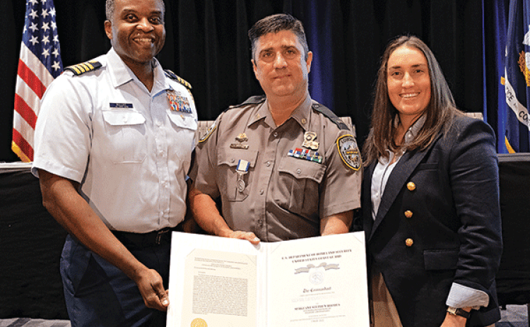Capt. Ulysses Mullins, Coast Guard Eighth District Chief of Staff, Sgt. Stephen Rhodes and LDWF Secretary Madison Sheahan. (Louisiana Department of Wildlife and Fisheries photo)