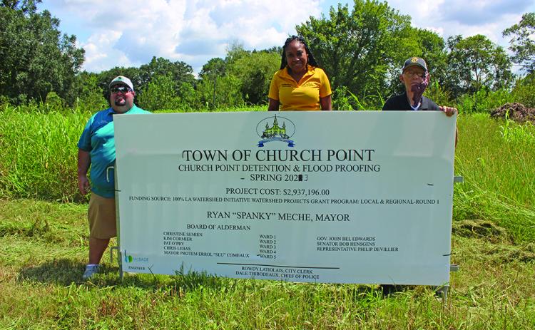 Plans are in motion to construct two detention ponds in Church Point, one in the Low Bottom area, and another near Corporation Street. The ponds, funded by a $2.9 grant from the Louisiana Watershed Initiative, will help to alleviate flooding in the  community. (Above) Pictured are Church Point Mayor Ryan "Spanky" Meche, Ward 1 Council member Christine Semien and Ward 5 Council member Errol "Slu" Comeaux in the Low Bottom area.
