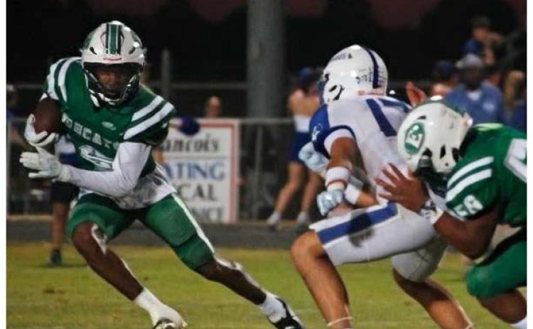 Eunice High’s junior wide receiver Brighton Laday fights for yardage in Eunice’s 35-16 loss to Erath last Friday. (Photo by Sports Editor Rhett Manuel)