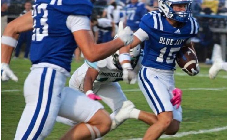 Sophomore wide receiver Hudson Simon runs for a big gain in the Blue Jays’ 60-0 win over Morgan City last Thursday. Simon had 150 yards on four catches. (Photo by Sports Editor Rhett Manuel)