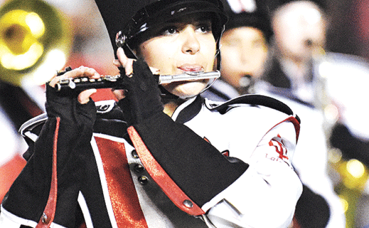 Kelly Blake Sonnier performs wtth the University of Louisiana at Lafayette band during the halftime show on Sept. 23. Sonnier is a sophomore member of the Pride of Acadiana band. She is a 2022 Eunice High graduate and the daughter of Becky and Michael Sonnier. (Photo by Tom Dodge)