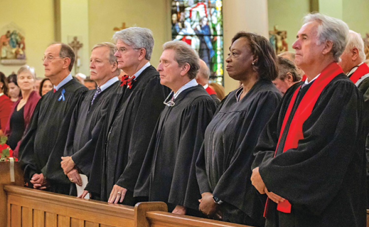 Louisiana Supreme Court Justices attended the 70th annual Red Mass at St. Louis Cathedral. From left, are Chief Justice John Weimer, Justice Scott Crichton, Justice Jay McCallum, Justice William Crain, Justice Piper Griffin and Justice James Genovese. Genovese is from Opelousas. (Submitted photo)