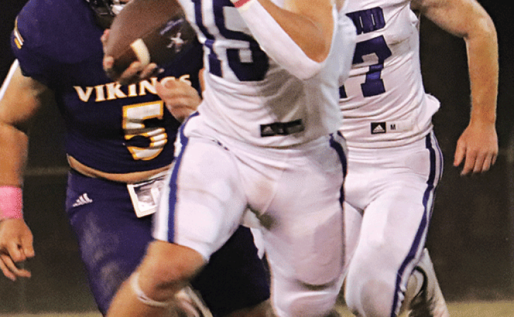 Blue Jay quarterback Kane West ran for 103 yards in the 46-42 win over Opelousas Catholic. (Photo by Amy Myers)