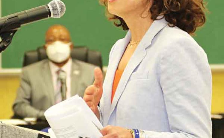 Dr. Tina Stefanski, regional medical director for Region 4, speaks about quarantine issues at Thursday’s St. Landry Parish School Board meeting. (Photo by Harlan Kirgan)