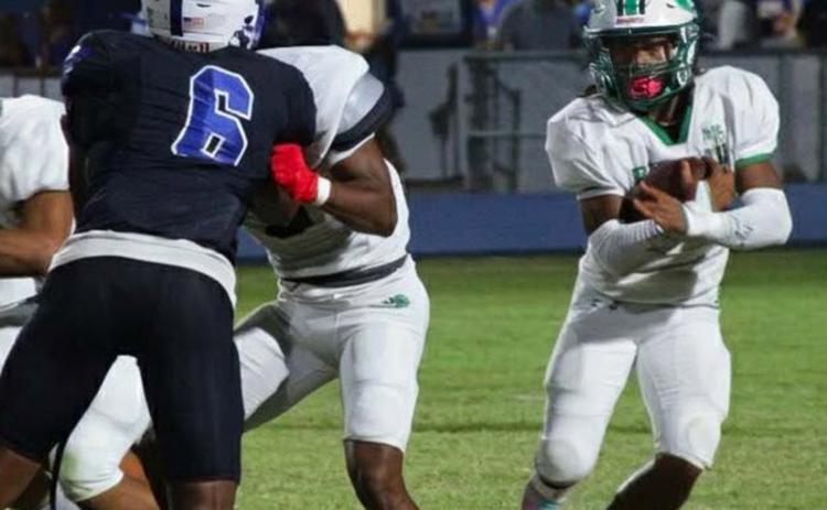 Eunice running back Ja’Quan Callaway looks for running room during last Friday’s 13-12 loss to the DeRidder Dragons in its District 3-4A opener.  (Photo by Sports Editor Rhett Manuel)