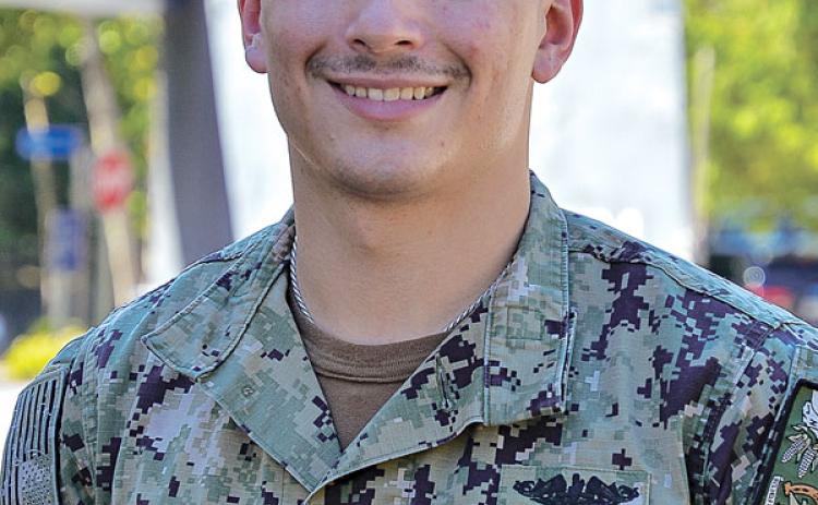 Seaman Conner Deshotel serves as a yeoman and joined the Navy to follow in the footsteps of his grandfather, Robert Reed. Photo by Lt. Cmdr. Jake Joy / Navy Office of Community Outreach
