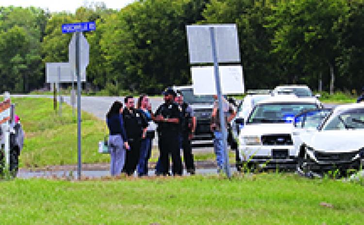 At about 12:30 p.m. Thursday a two-vehicle wreck occurred at the intersection of La. 13 South and Sittig Road.  A report from Eunice Police Chief Kyle LeBouef, said, “One vehicle traveling east attempting to cross over Hwy. 13 from Sittig Road onto Perchville Road struck a northbound vehicle on Hwy. 13. No injuries were reported.” (Photo by Harlan Kirgan)