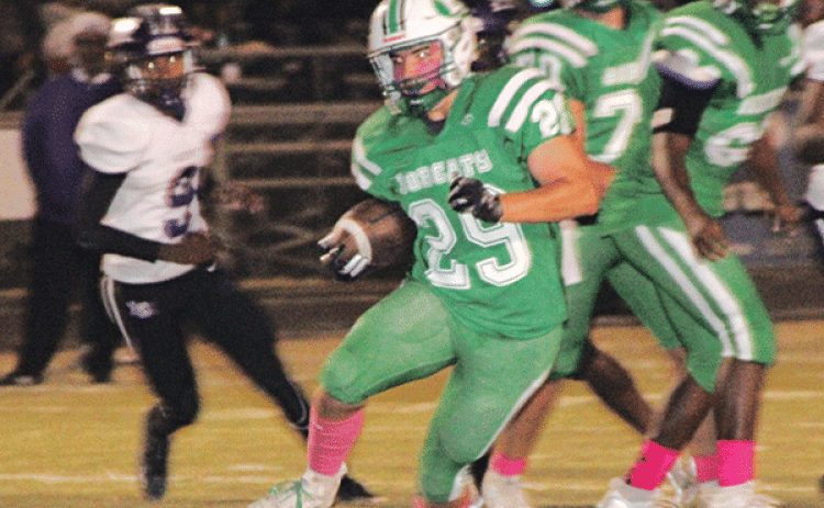 Eunice High’s Aiden Lejeune picks up some yardage in the 24-20 win over LaGrange at Paul Trosclair Stadium.